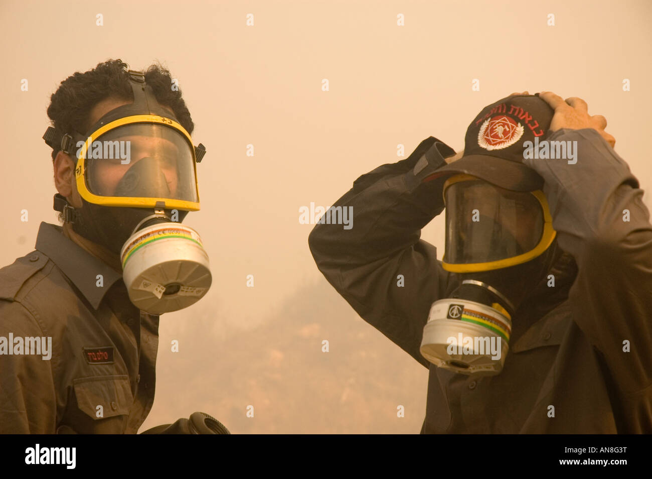 Two men wearing gas masks Stock Photo Alamy