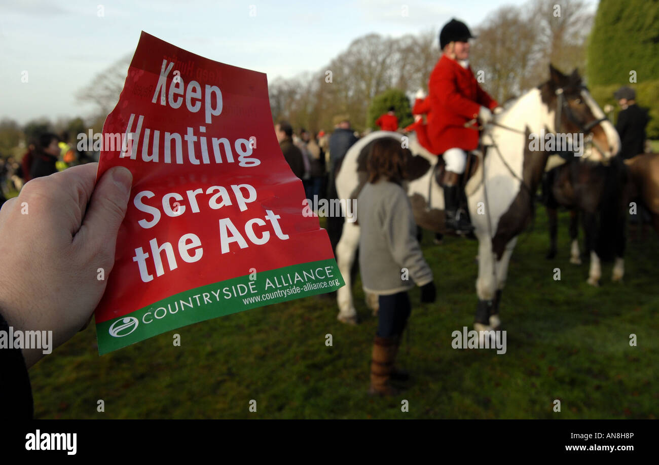 A Countryside Alliance supporter holding a handbill to scrap the Fox Hunting Act during a hunt. Stock Photo