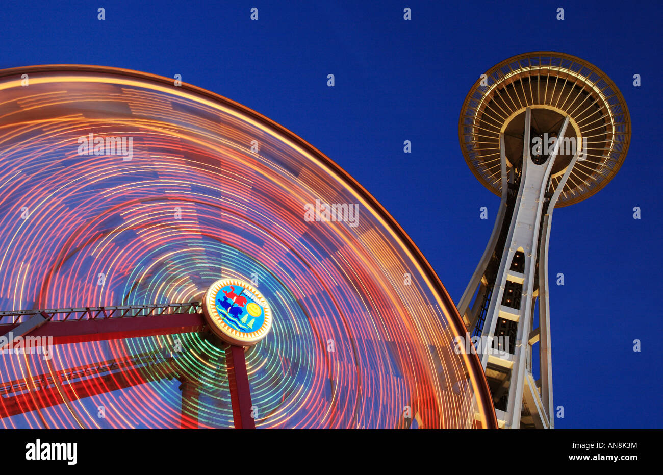 Space Needle and Ferris wheel in Seattle's Pacific Science Center Stock