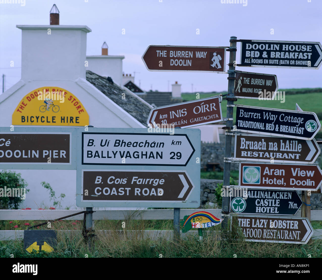County Clare, Ireland: road signs at an intersection in the village of Doolin Stock Photo