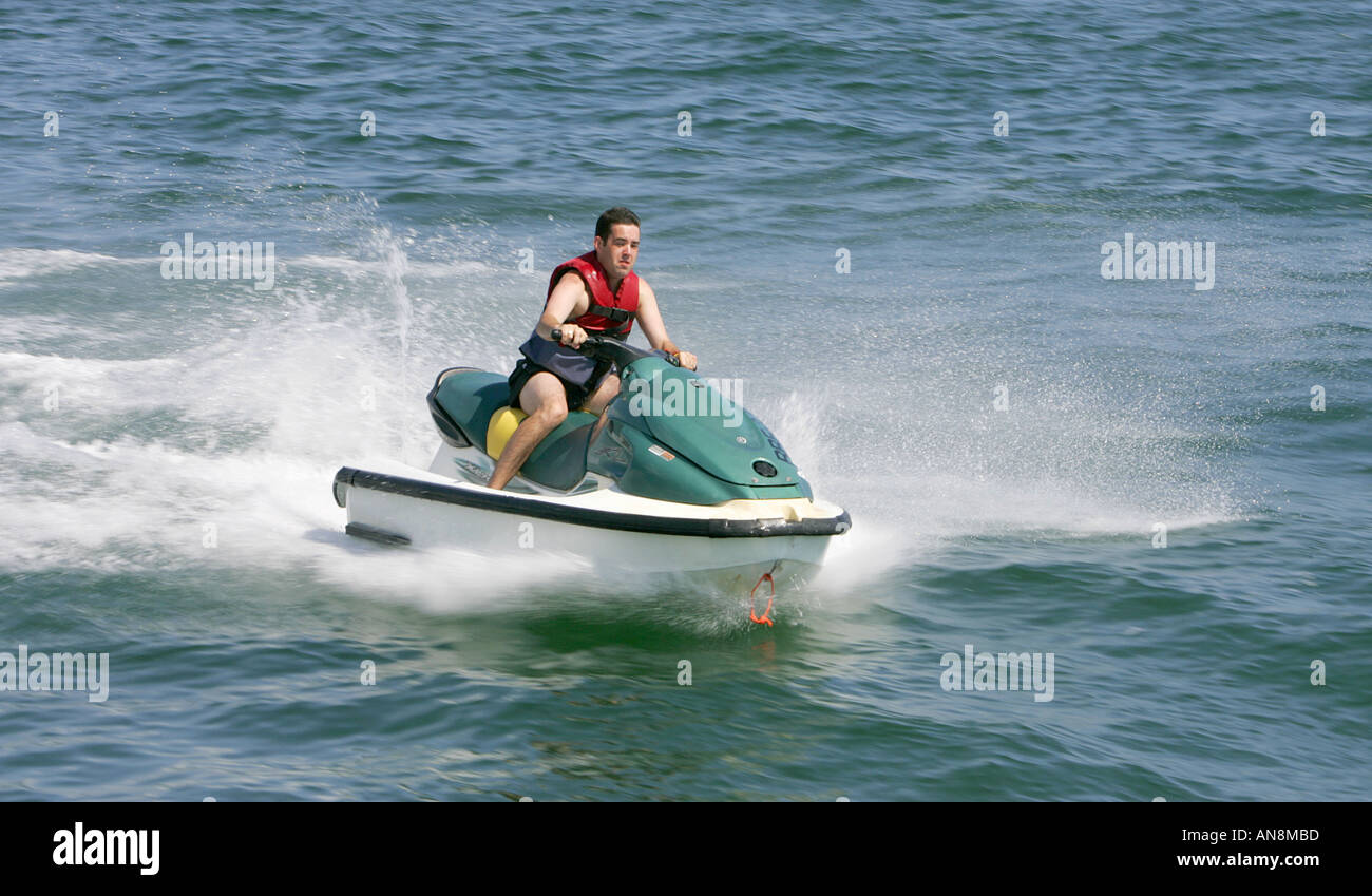 Man on jet ski waves Bulgaria Black sea site dune action active