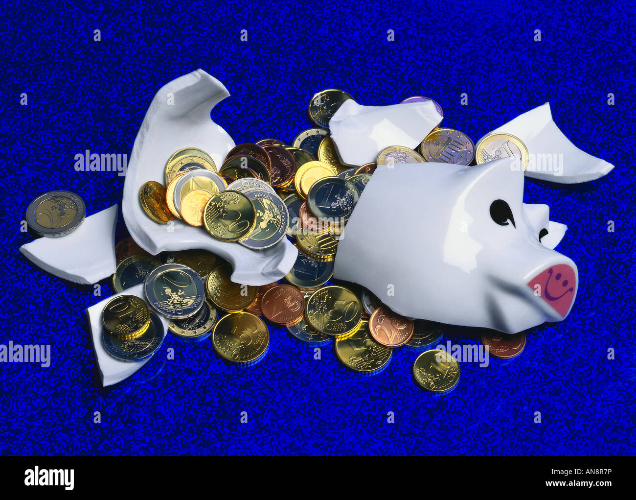 Broken piggy bank Stock Photo