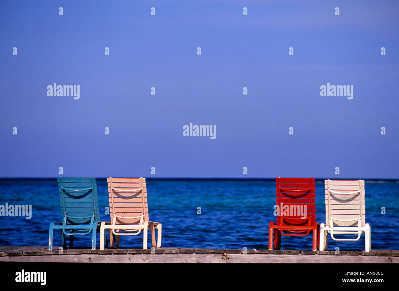 Deck chairs Ambergris Caye Belize Stock Photo Alamy