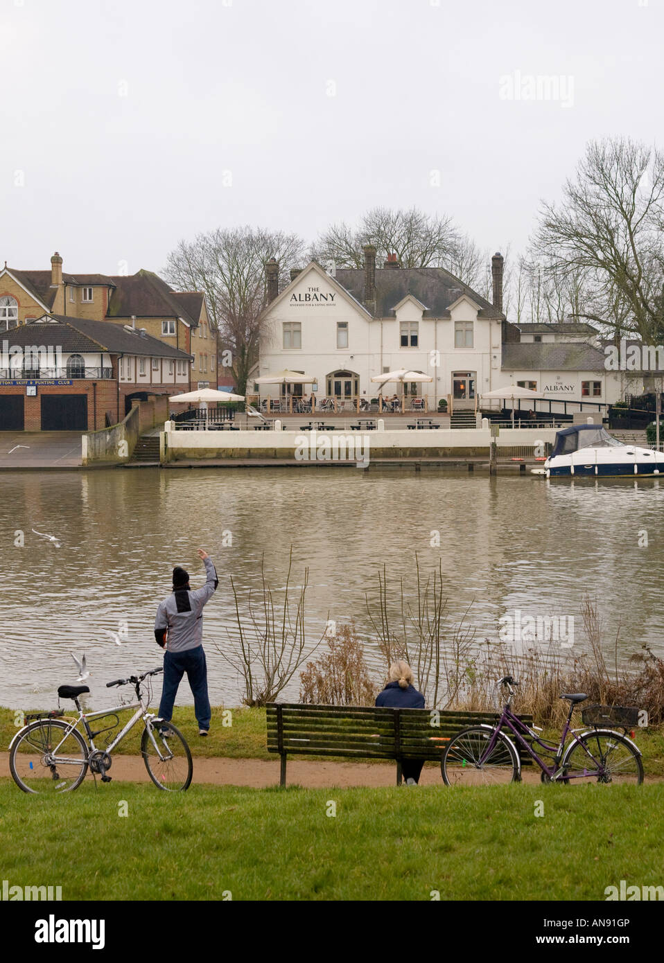view across River Thames to Albany pub in Thames Ditton, Surrey near