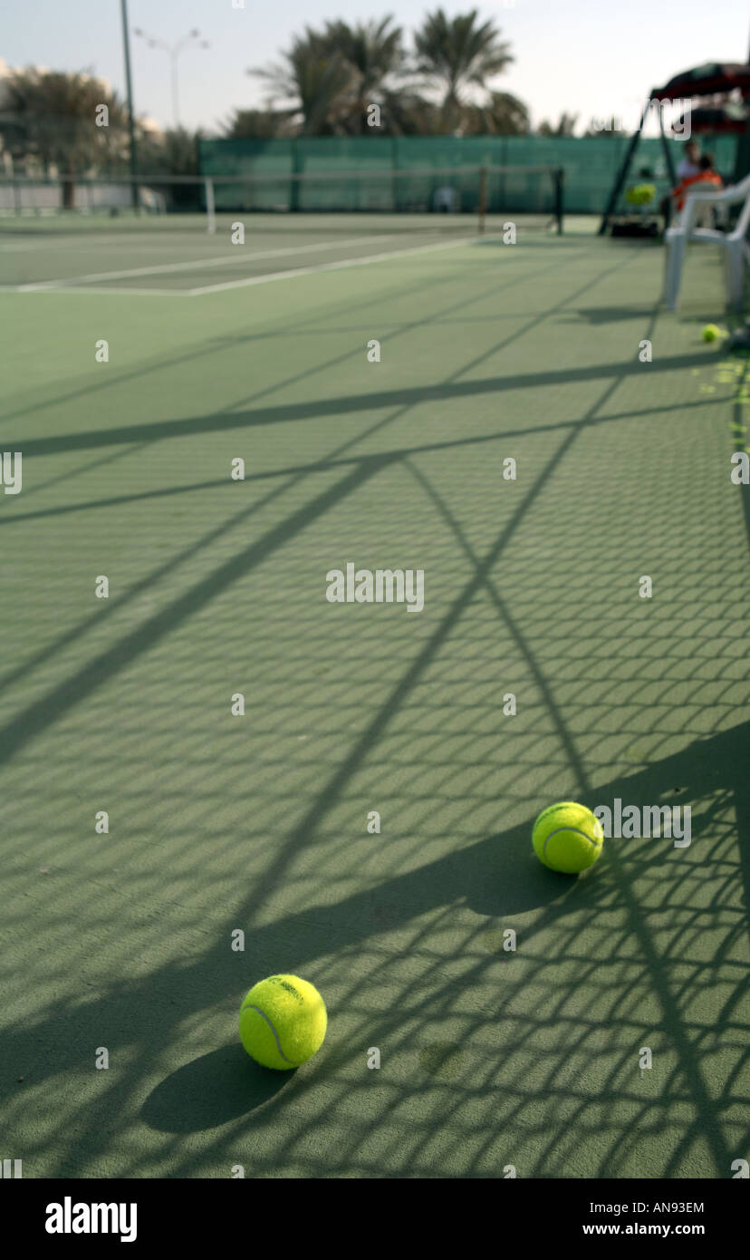 Tennis balls scattered on a practice court during the Qatar men's open