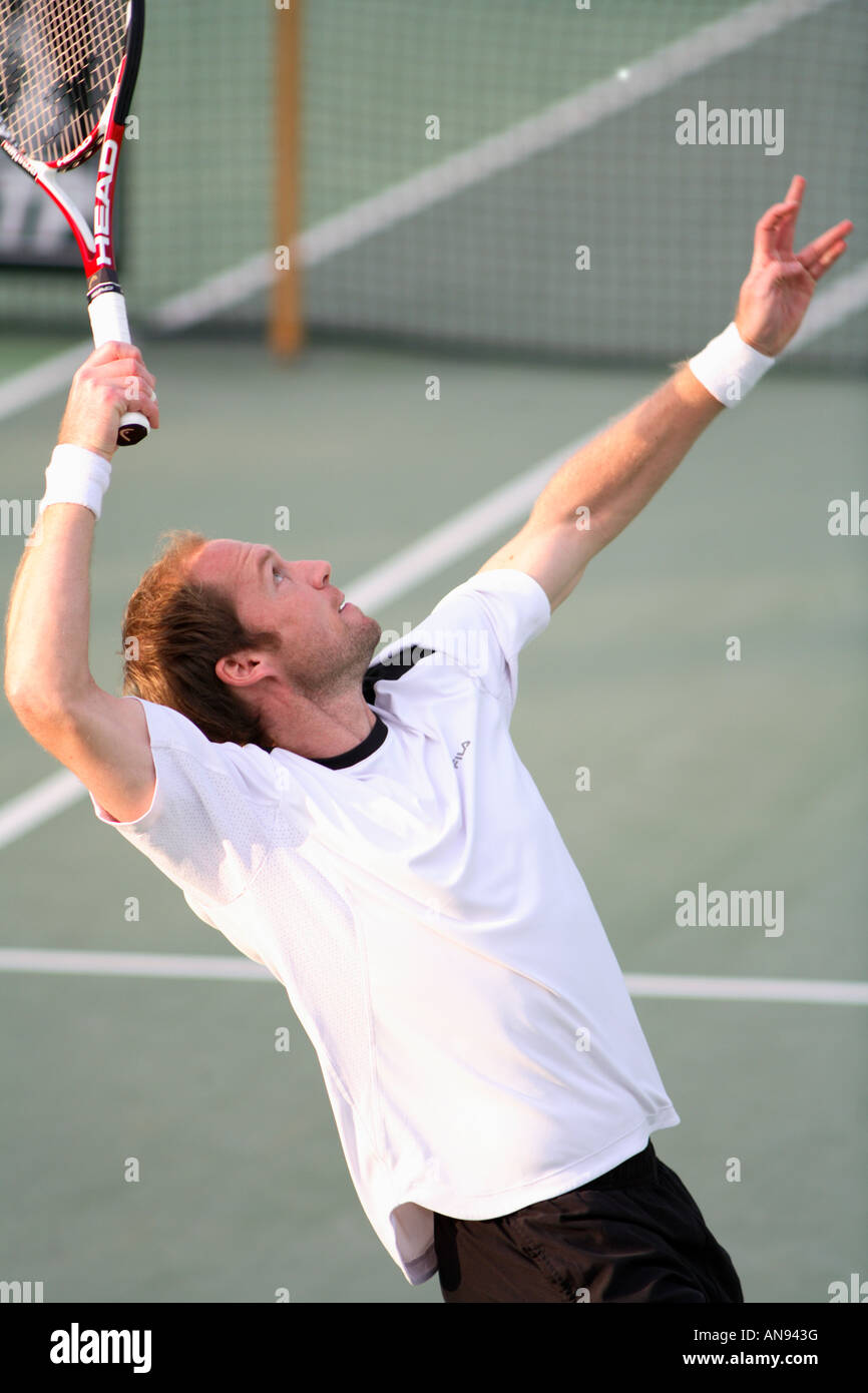 Tennis player Rainer Schuettler of Germany serving in his first round match at the Qatar Open 2008 in Doha Stock Photo