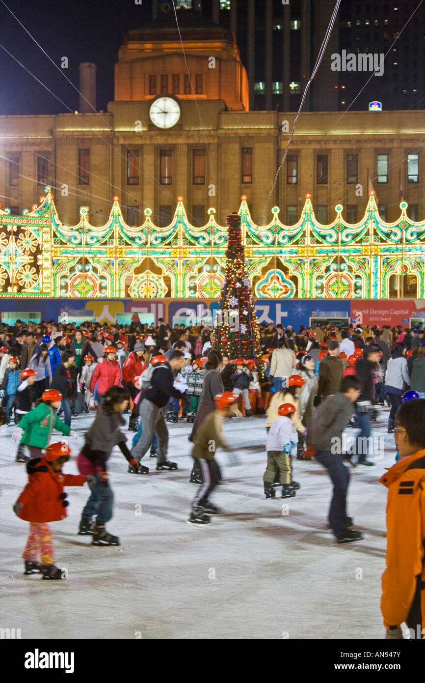Korean People Ice Skating on a Rink in front of City Hall Seoul South