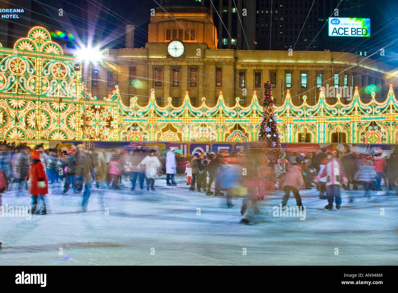 Korean People Ice Skating on a Rink in front of City Hall Seoul South