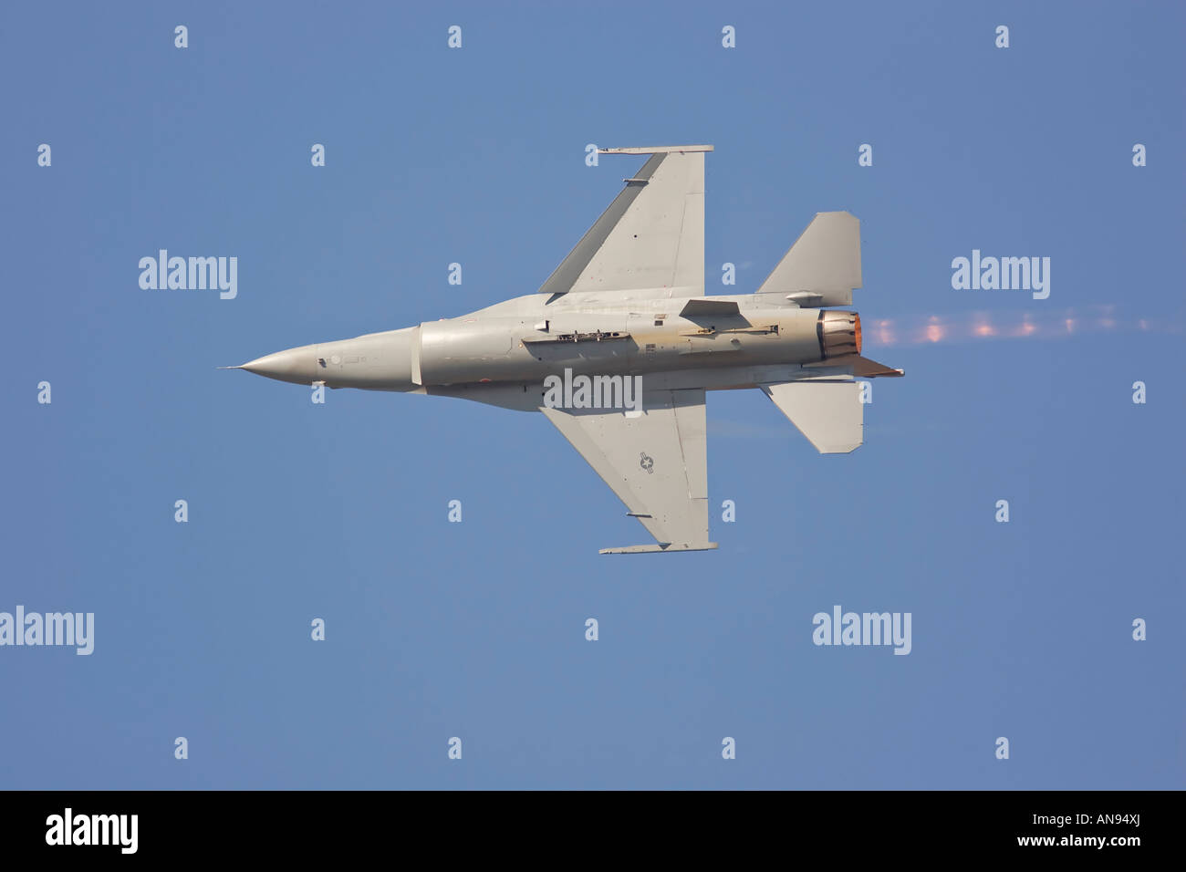 F 16 Fighting Falcon Viper rolling pass belly shot Stock Photo
