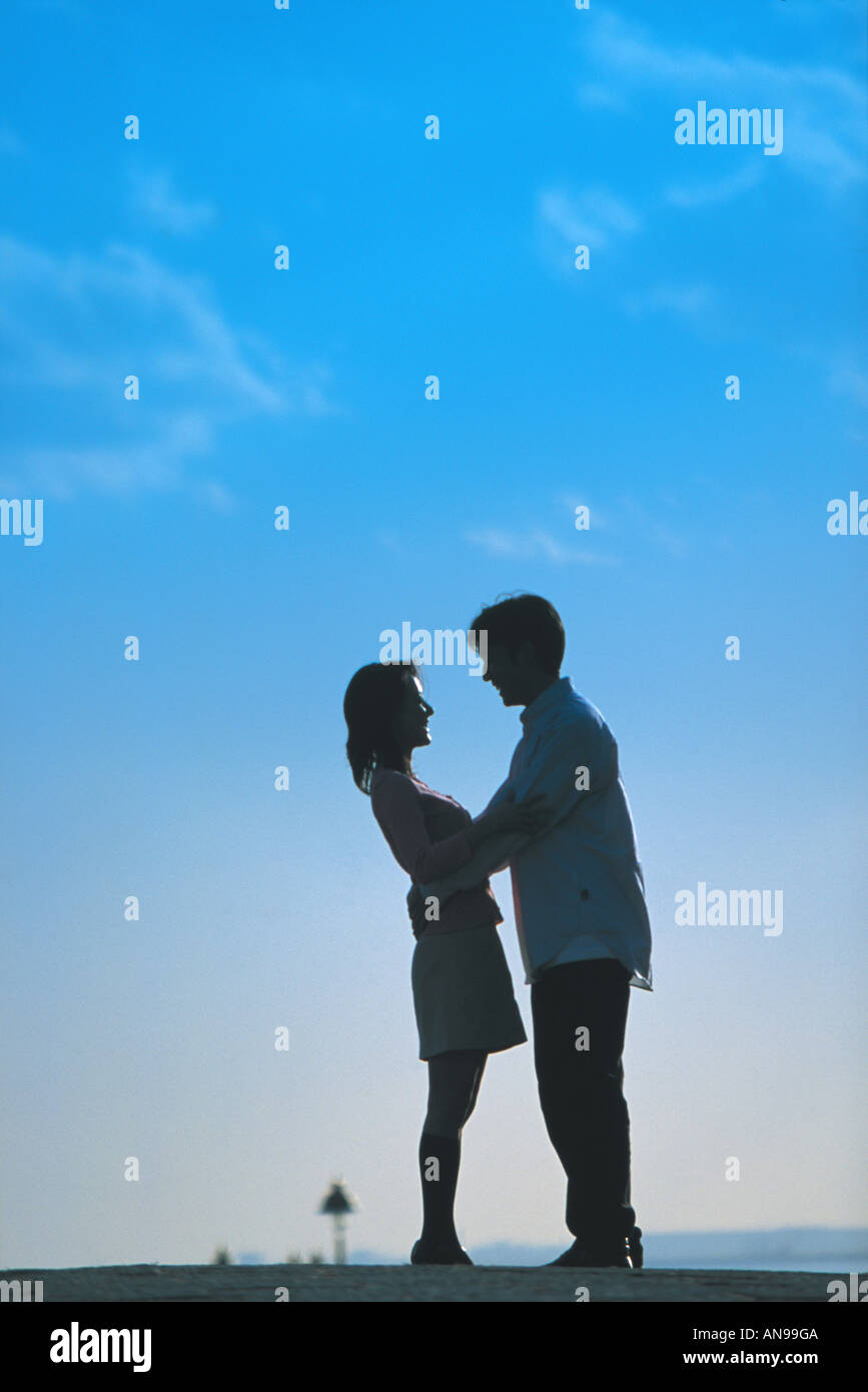 2 women hugging and silhouette hi-res stock photography and images - Alamy