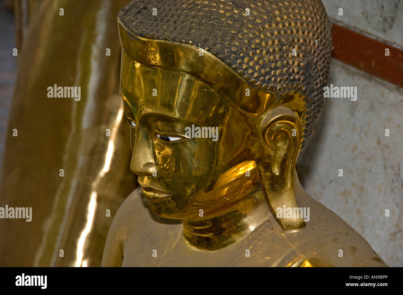 Freshly cast bronze Buddha statue from a foundry in Amarapura, Burma. Stock Photo
