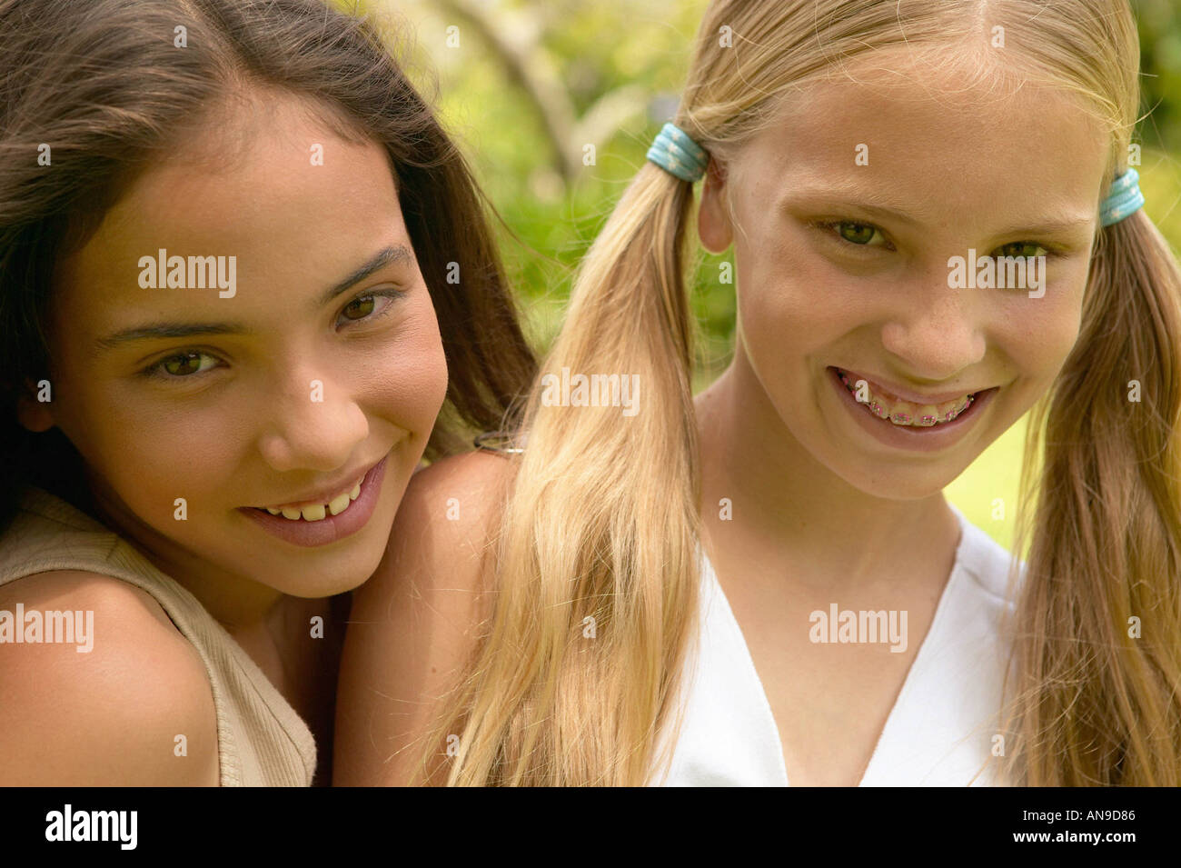 Two smiling young girls Stock Photo