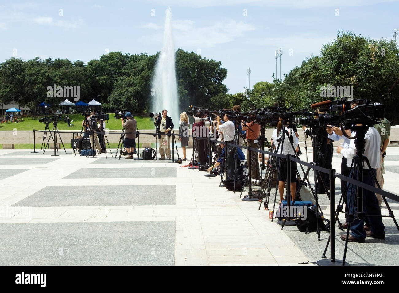 Row of Photographers outside of LBJ Library in Austin TX Stock Photo