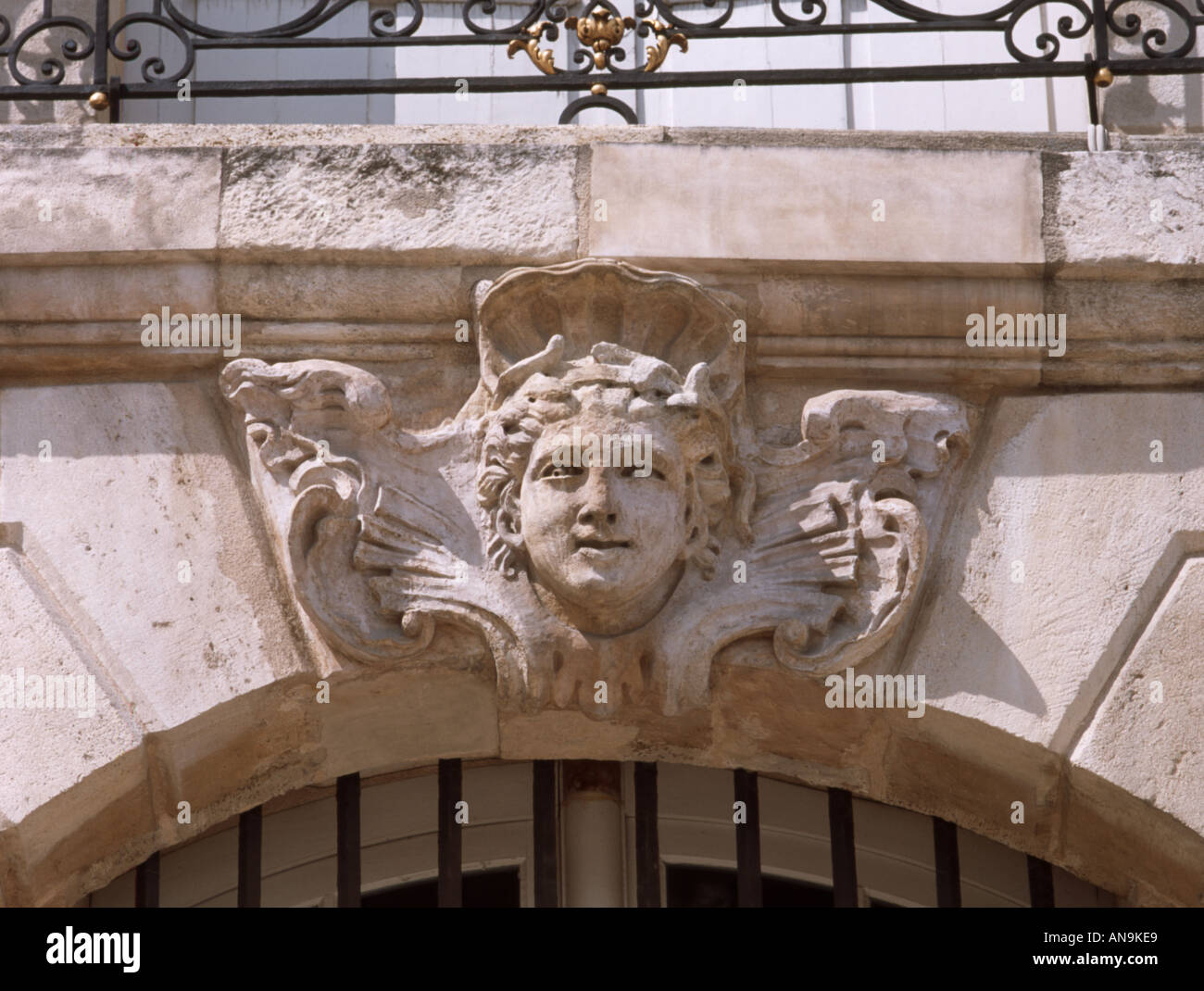 Bordeaux, Aquitaine, France. Place de la Bourse. One of the typical 18thC Mascarons or masks found above on keystones windows in the city Stock Photo