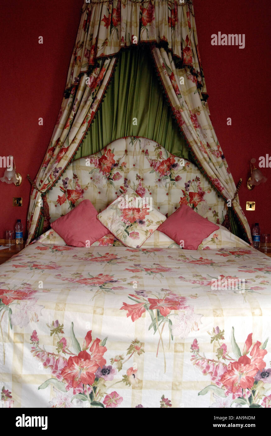a cheap hotel on the isle of wight with dated furnishings and tacky bedclothes Stock Photo Alamy