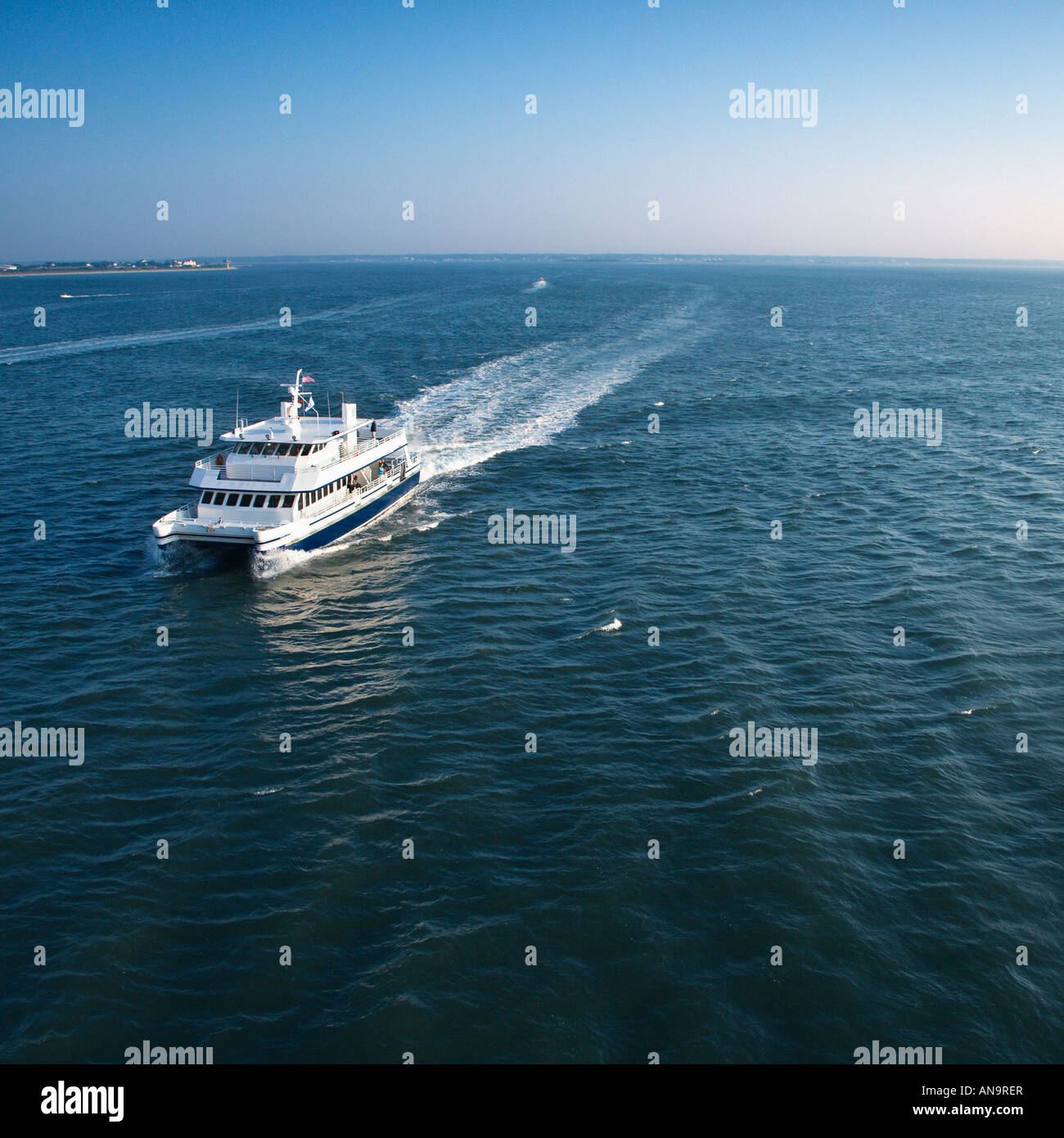 Aerial view of passenger ferry boat in open waters near Bald Head Island North Carolina Stock