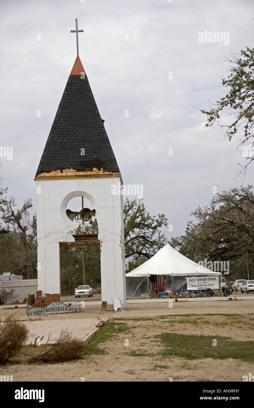 Damage caused by Hurricane Katrina Waveland Mississippi  Church destroyed with temporary shelter relief tent in background Stock Photo