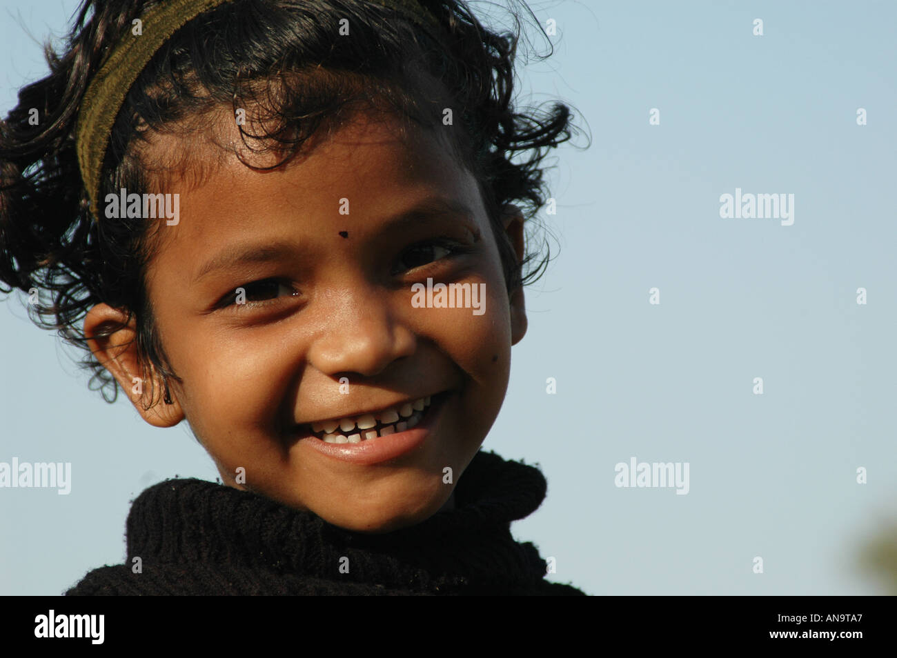 Portrait of smiling young north Indian Girl Stock Photo