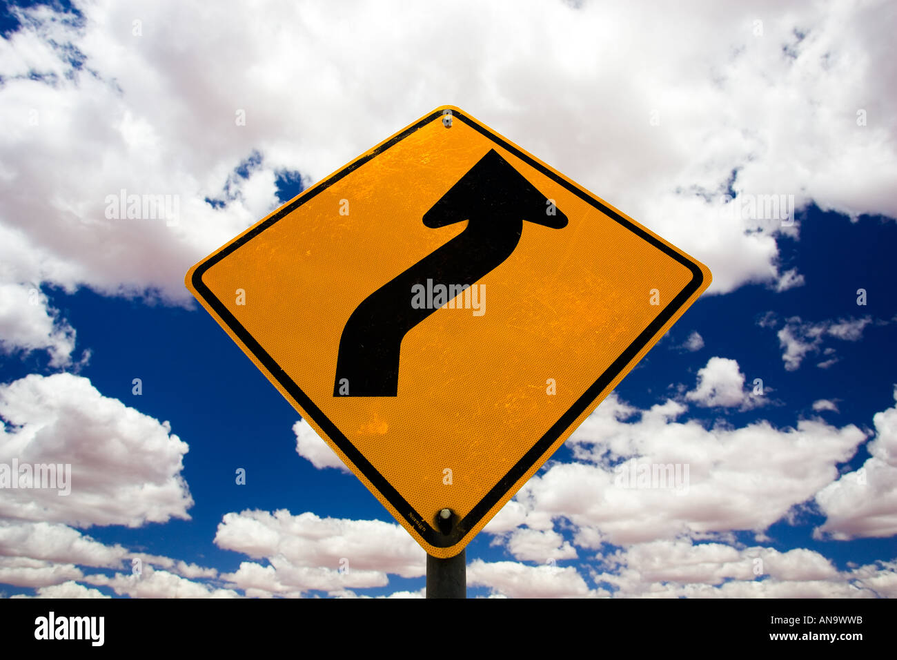 Road Sign warning of bends in road Red Centre Australia Stock Photo