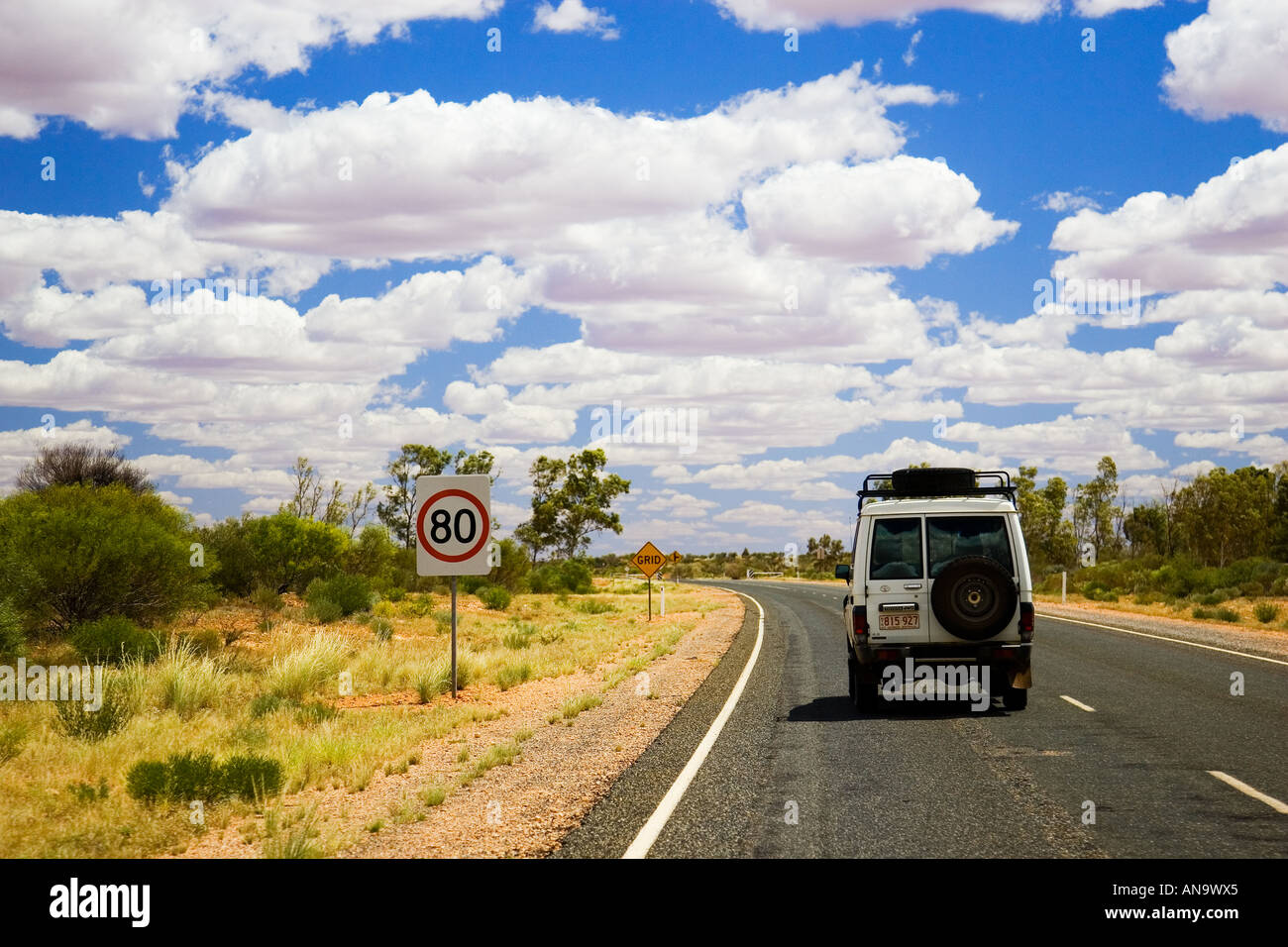 Four wheel drive vehicle on road in the Red Centre Northern Territory
