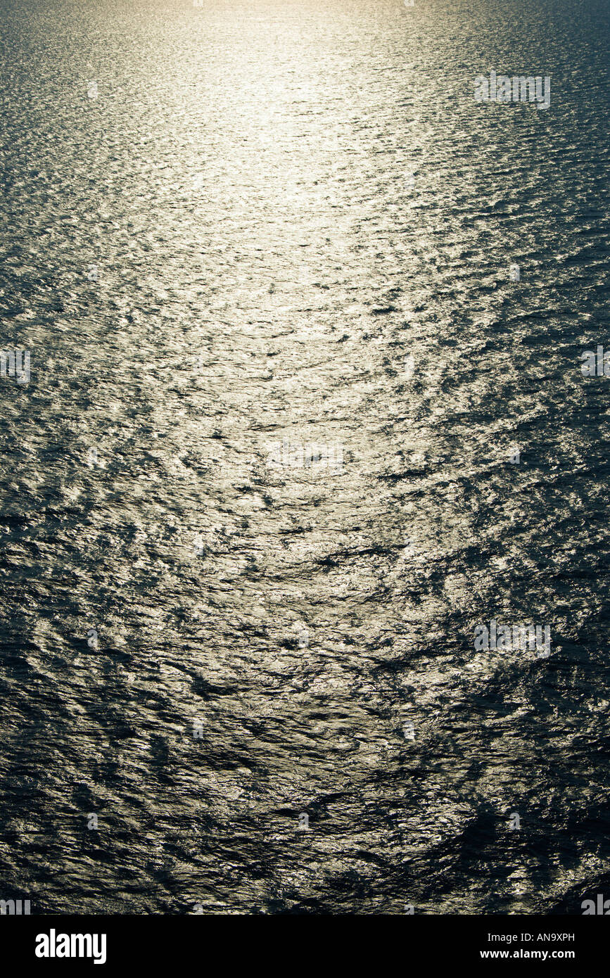 Sun reflecting on water Stock Photo - Alamy