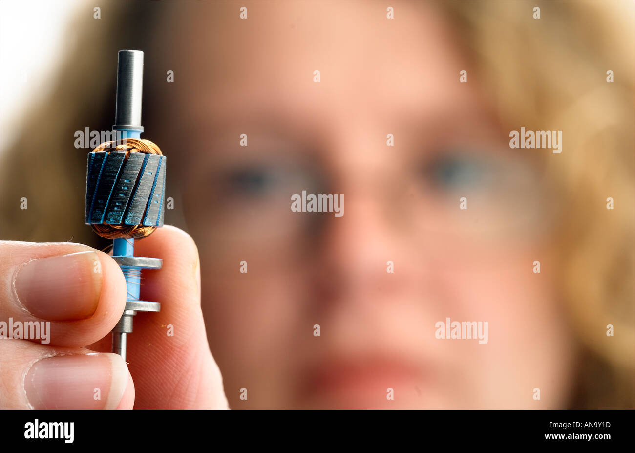 female engineer inspecting a component Stock Photo