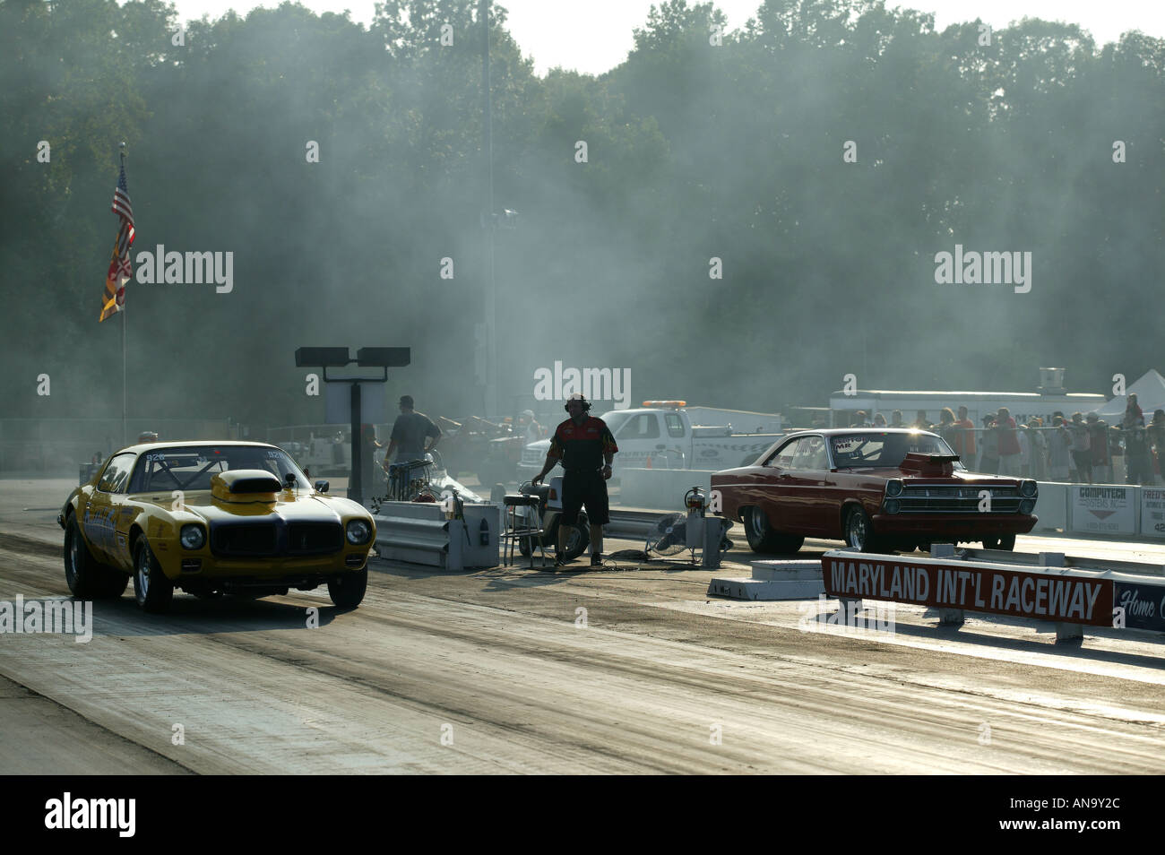 drag racing at Maryland international speedway with rocket trucks and top fuel cars and motorbikes Stock Photo