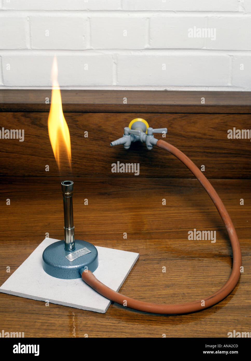 bunsen burner with air hole closed produces smoky yellow flame Stock