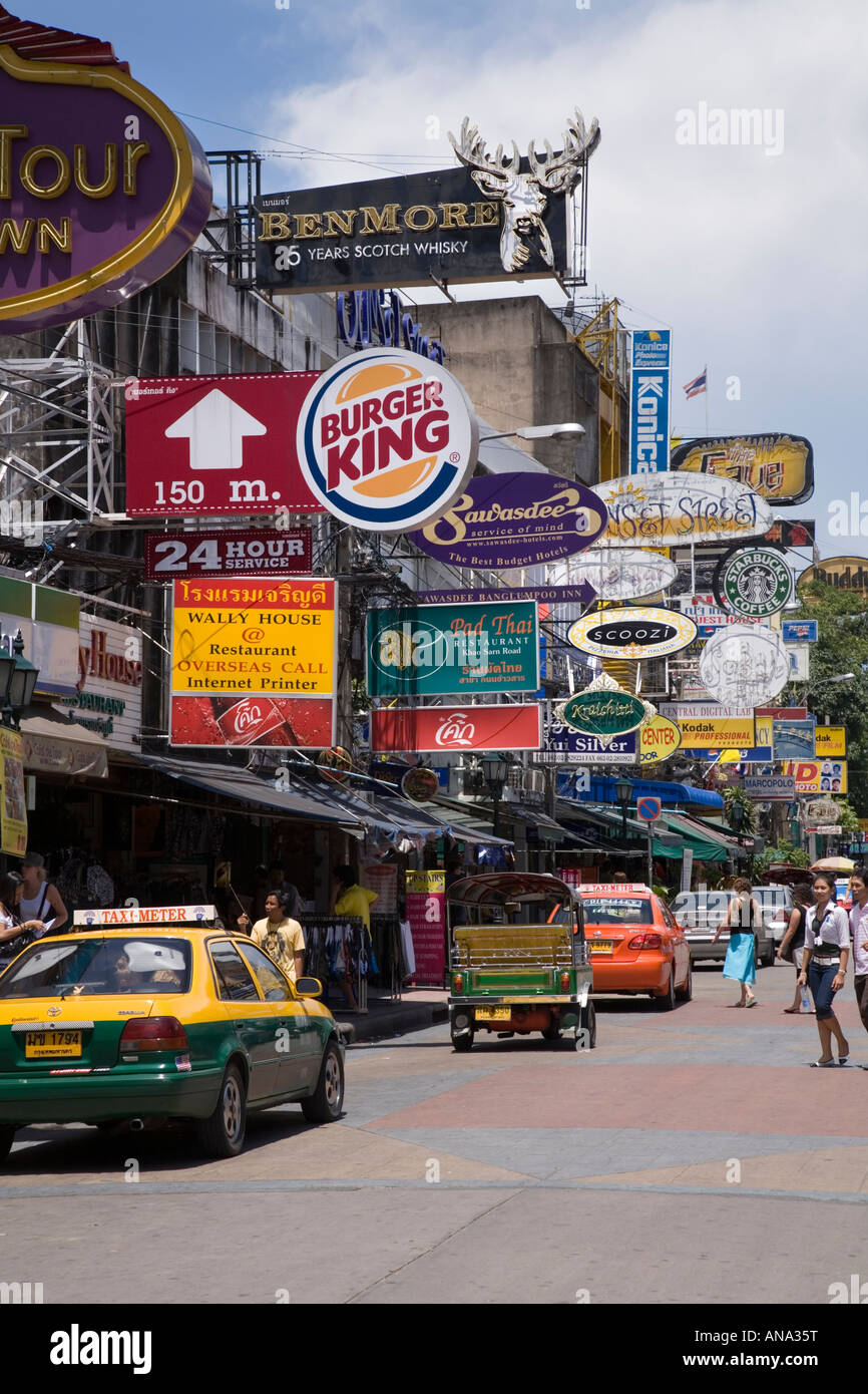 Street signs and tuk tuk on the Khao San Road in Bangkok, Thailand. Stock Photo