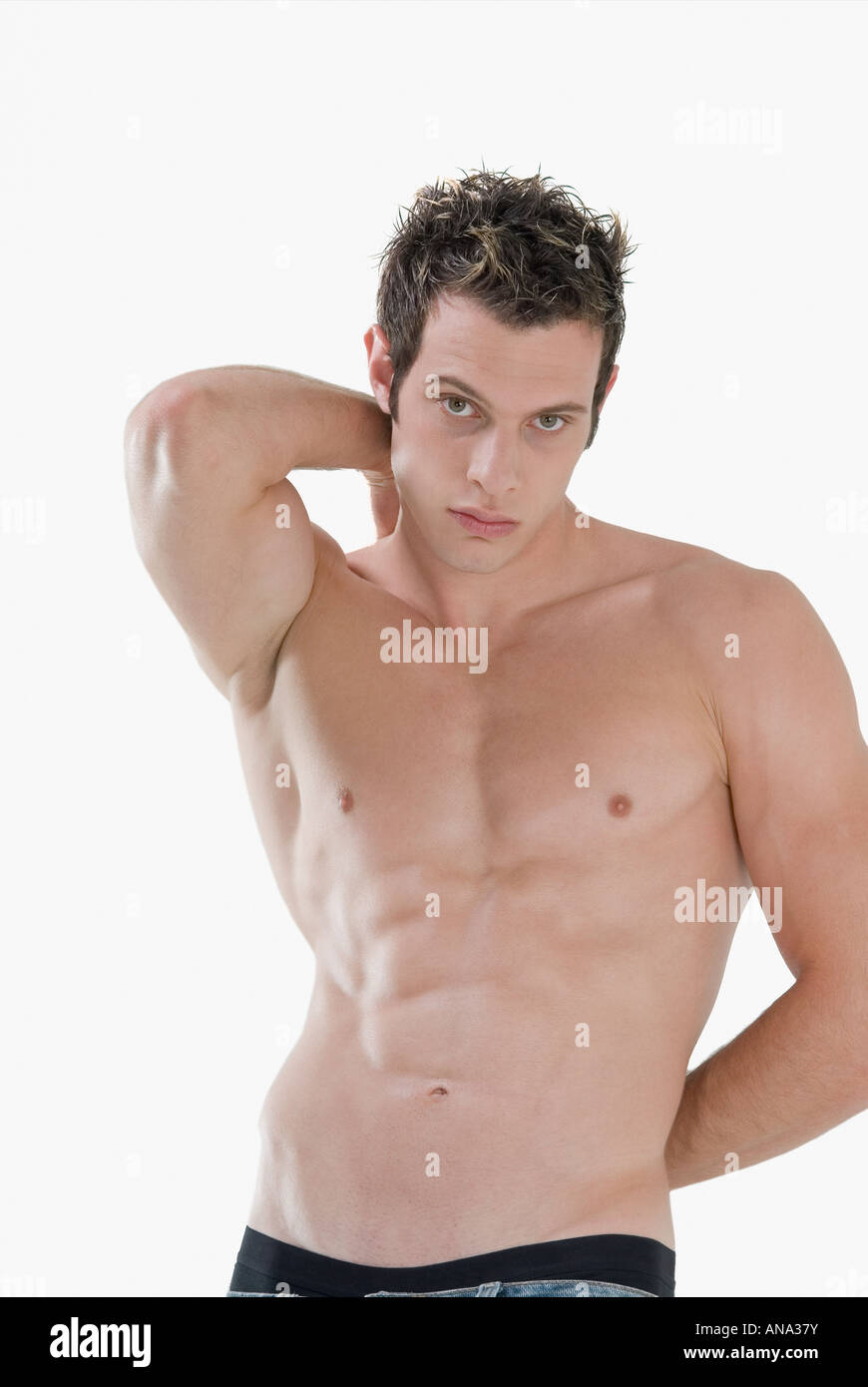 Barechested man with arms behind back Stock Photo Alamy