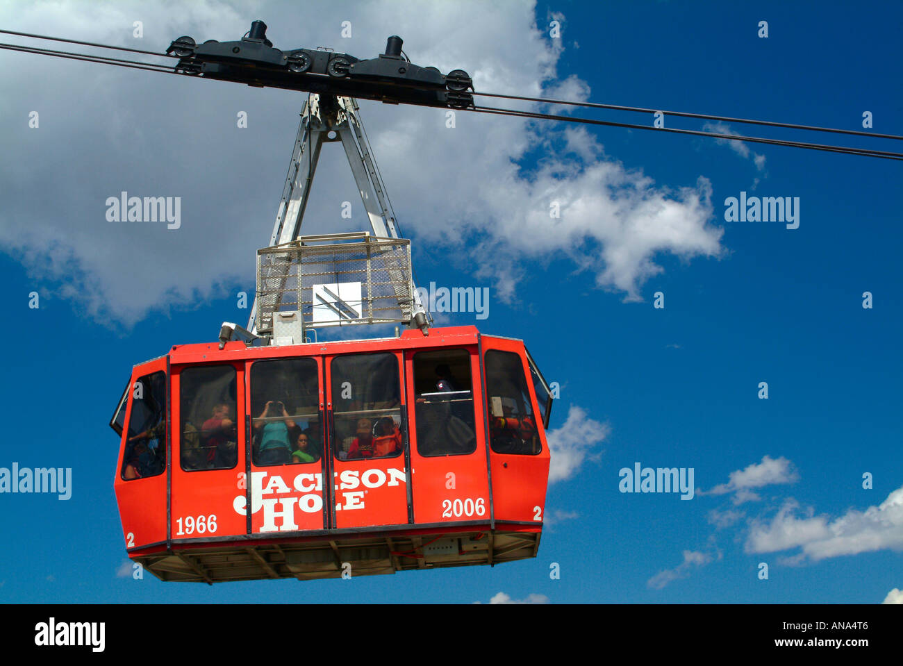Red Aerial Tramway Car Suspended on Cable Above Teton Village Jackson