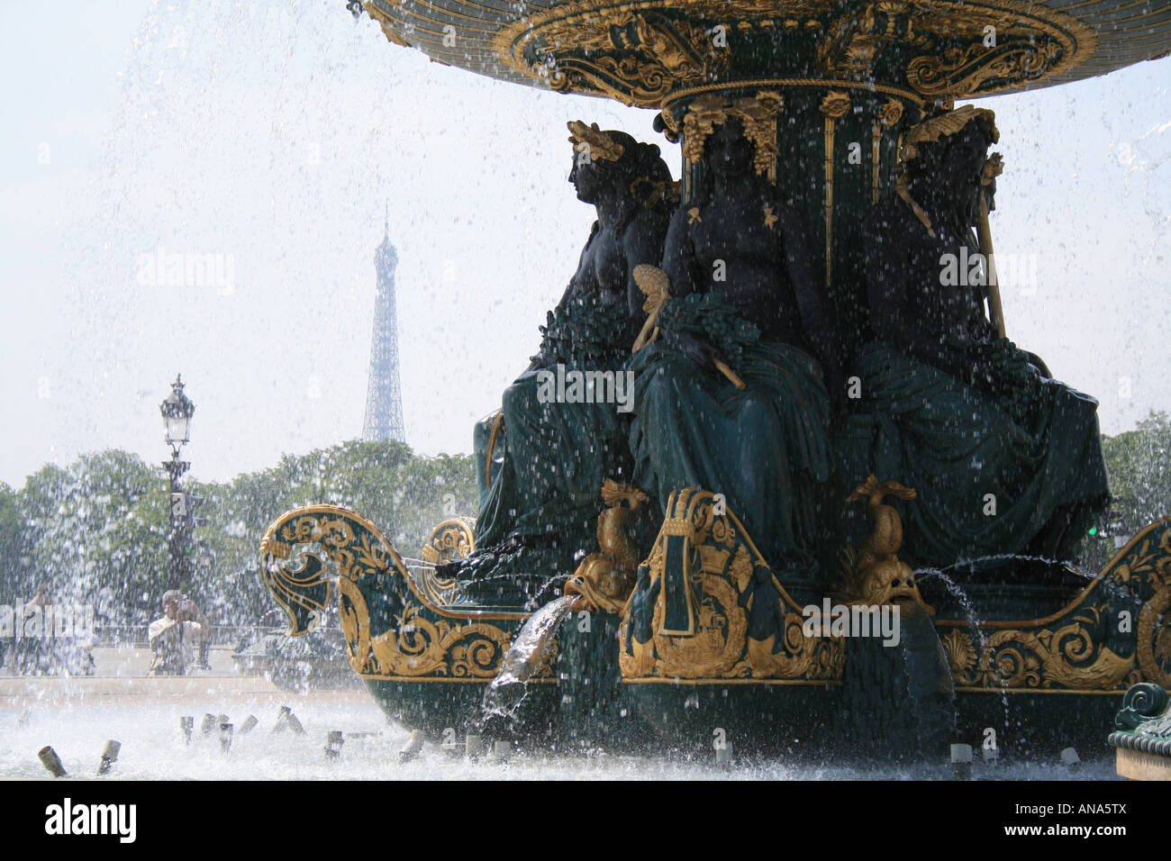 Fountains and statues on the Place de la Concorde with Eiffel Tower, Paris Stock Photo