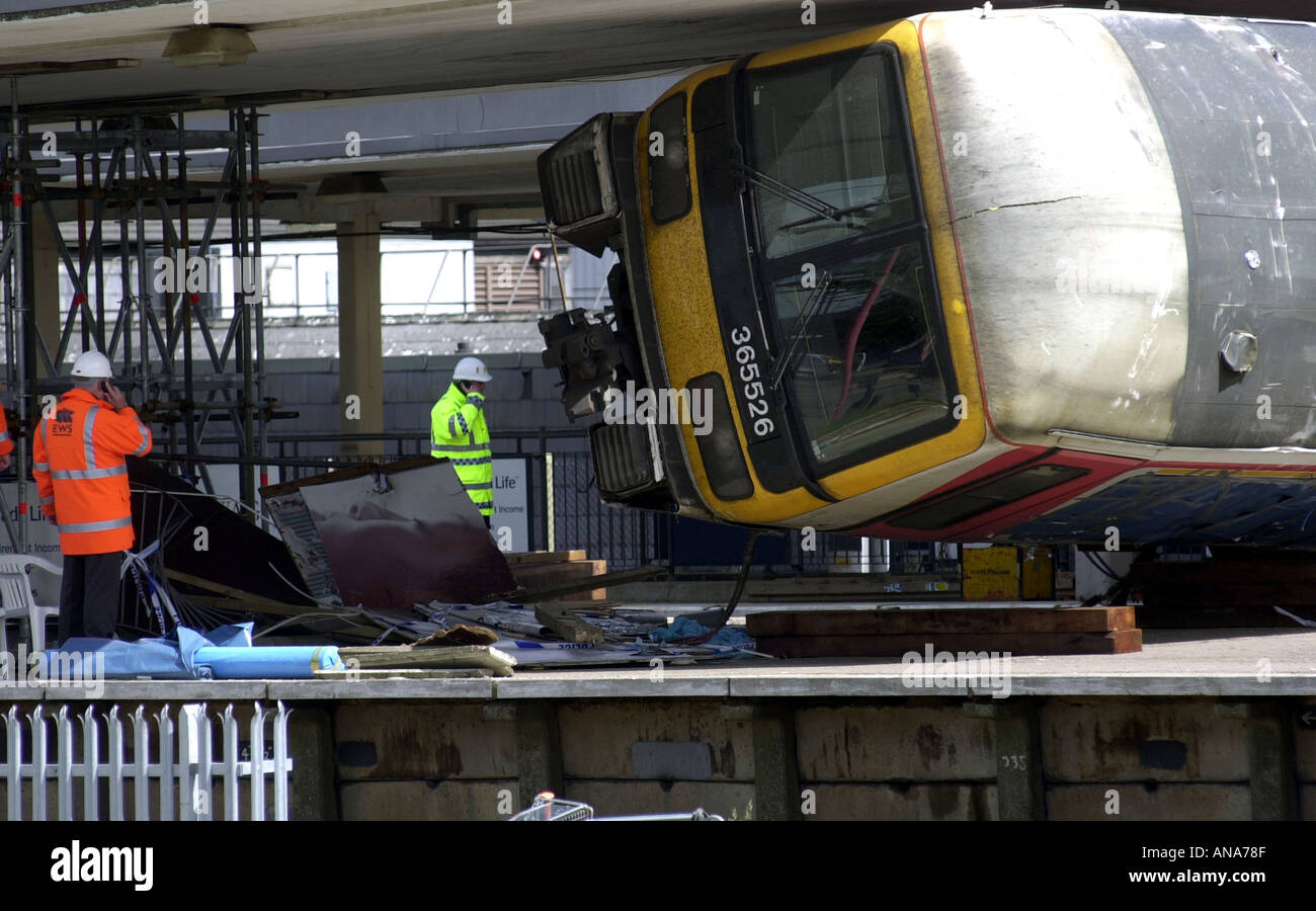 Engineers examine a carriage at the Potters Bar rail crash UK Stock