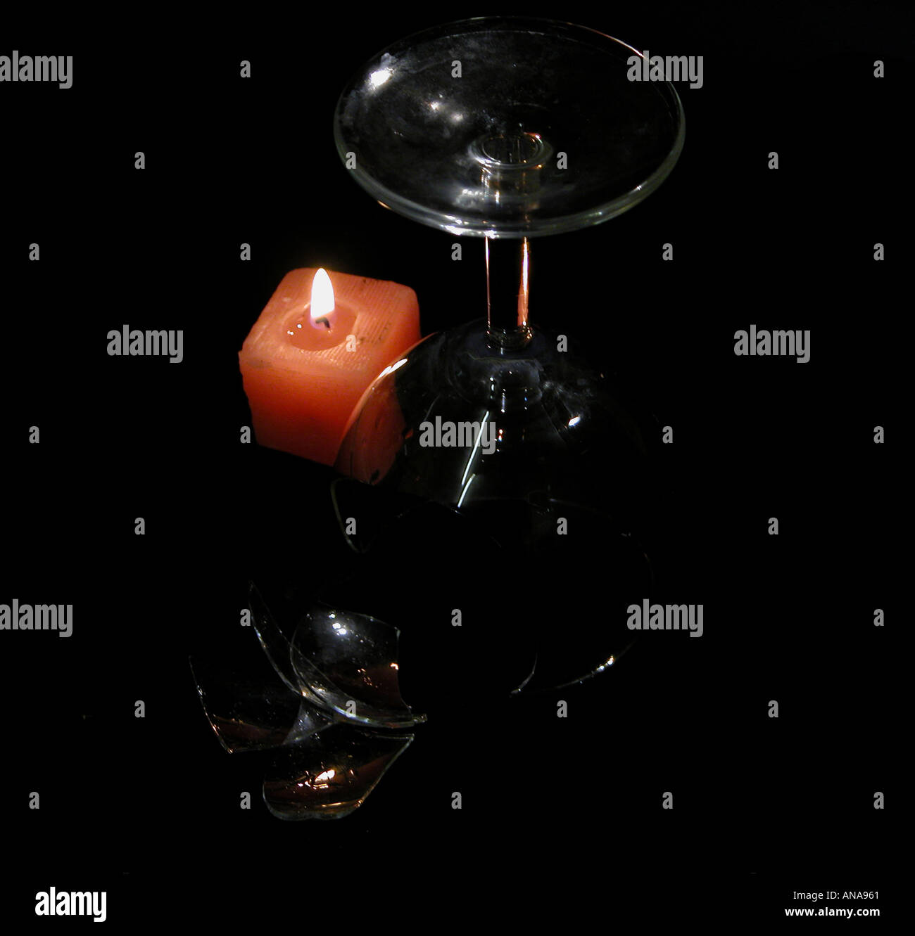 broken glass and candle Stock Photo Alamy