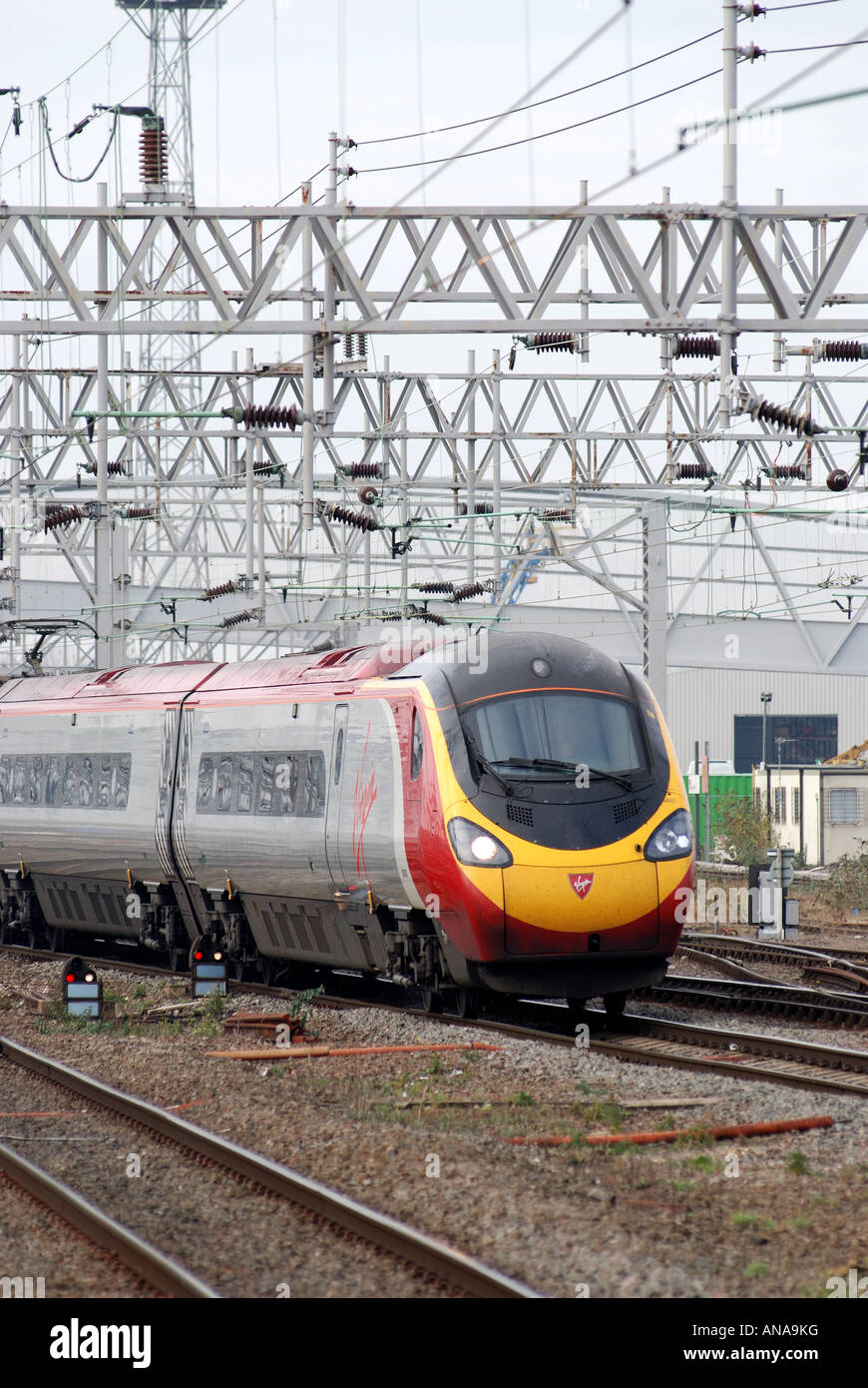 Virgin Pendolino electric train at Rugby, England, UK Stock Photo - Alamy