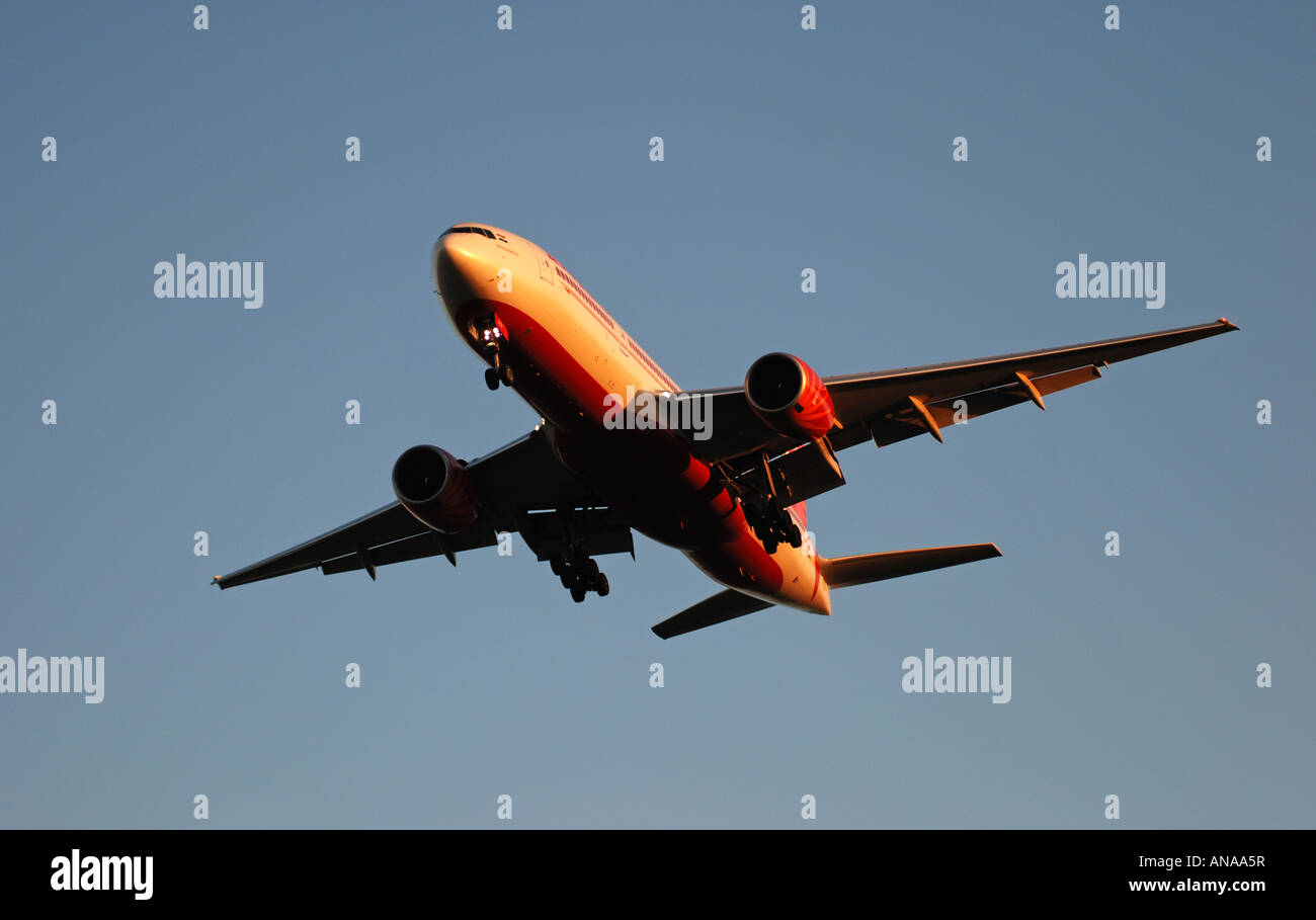 Air India Boeing 777 aircraft approaching Birmingham International Airport, England, UK Stock Photo