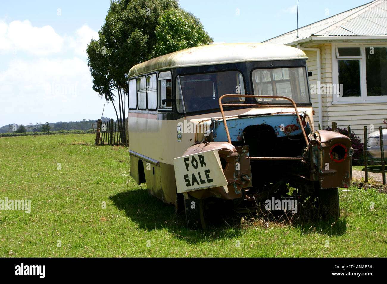 well worn outdated and rusty bus for sale North Island New Zealand Stock Photo