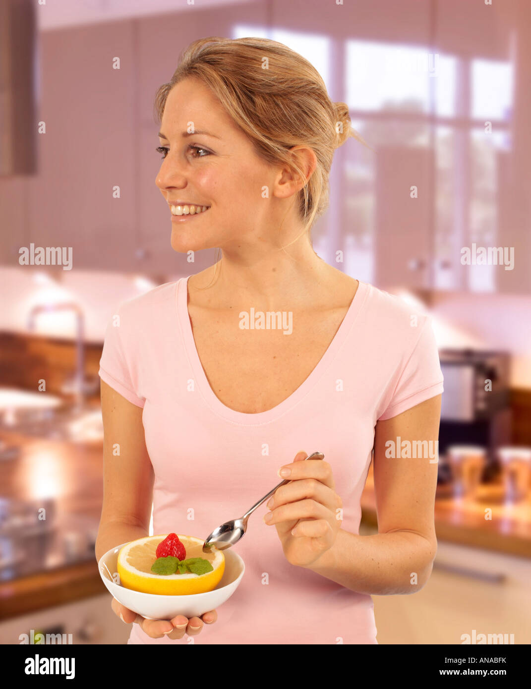 GIRL EATING GRAPEFRUIT Stock Photo Alamy