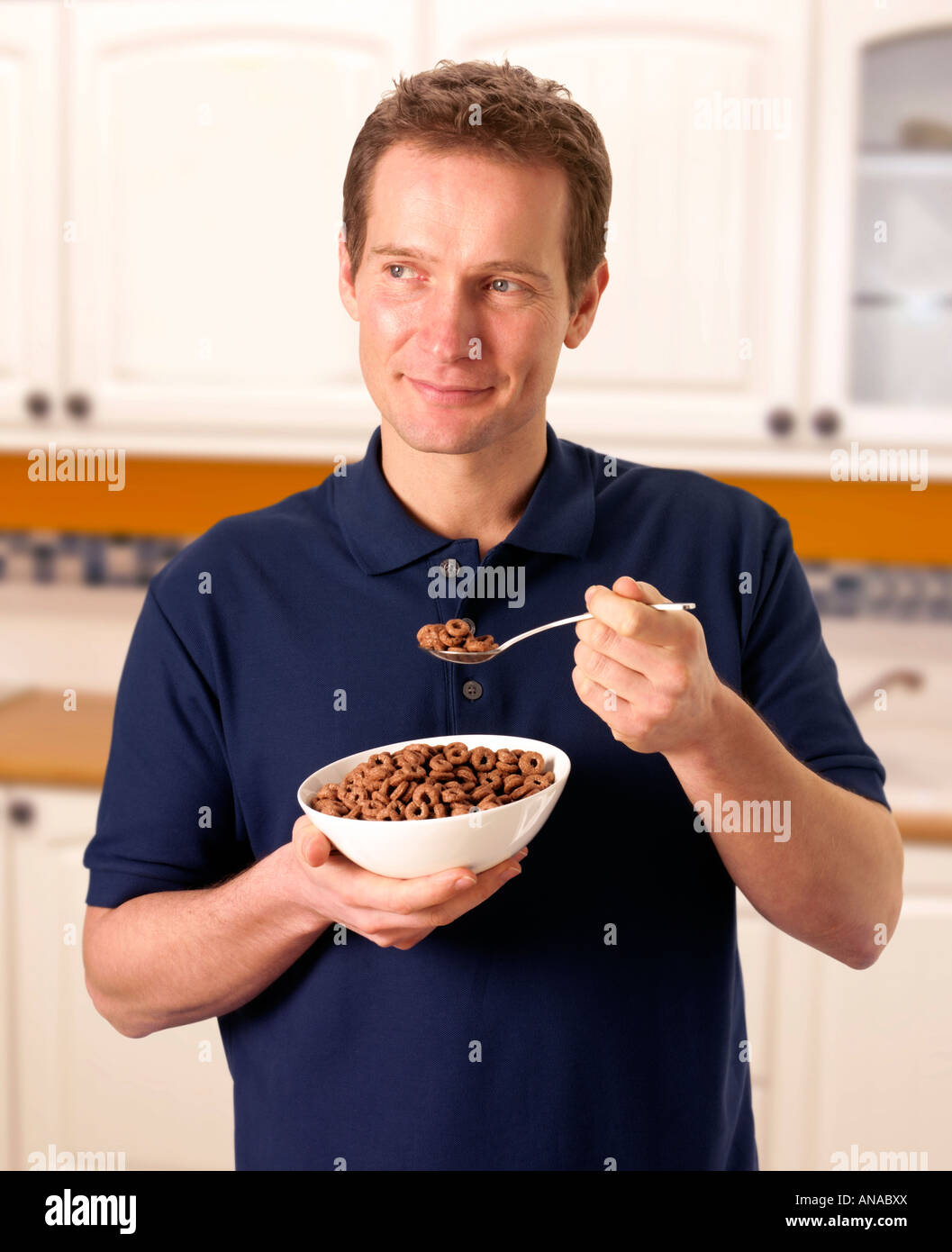 Man eating cereal hires stock photography and images Alamy