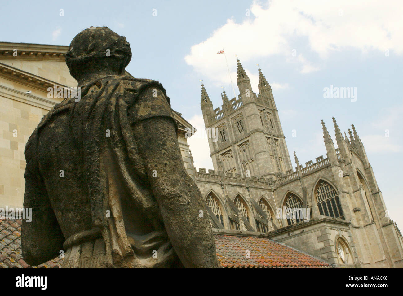 Sculpture at Roman Baths overlooking Bath Abbey in City of Bath in Somerset UK Stock Photo