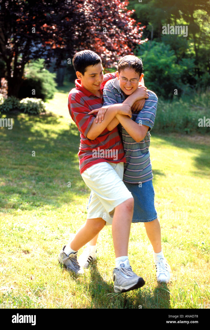 Boys fighting playfully hires stock photography and images Alamy