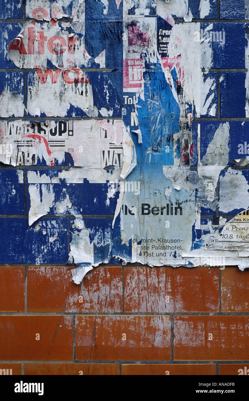 Old posters on a wall in what was once the Communist ruled sector of East Berlin Stock Photo