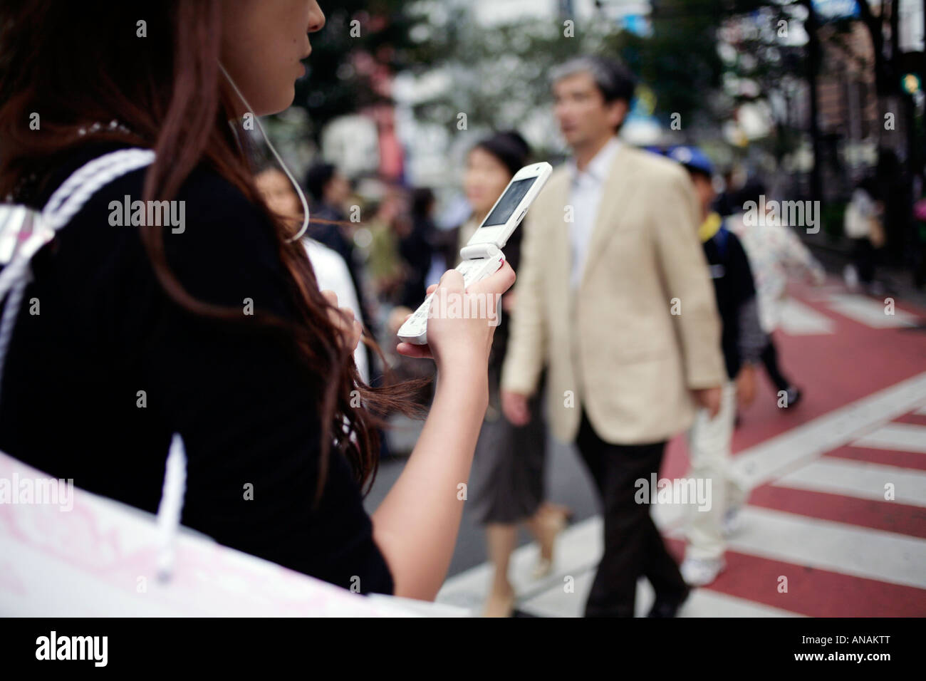 Tokyo Shibuya Girl with mobile phone Stock Photo