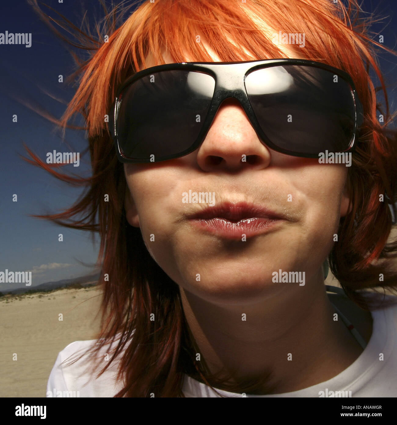 portrait of a young redheaded woman with sunglasses Stock Photo - Alamy