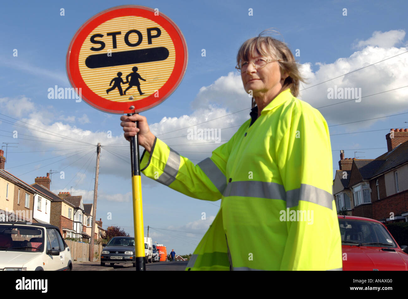 Lollipop lady Maureen Thoroughgood at work on a crossing patrol in Margate, Kent Stock Photo
