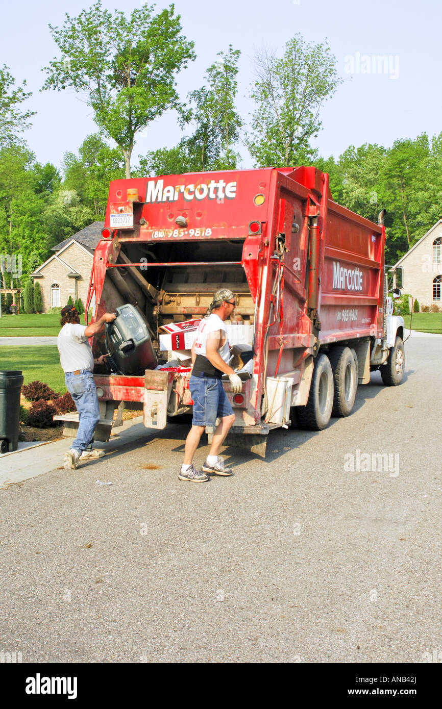 Local Neighbourhood rubbish collection workers pick up household trash