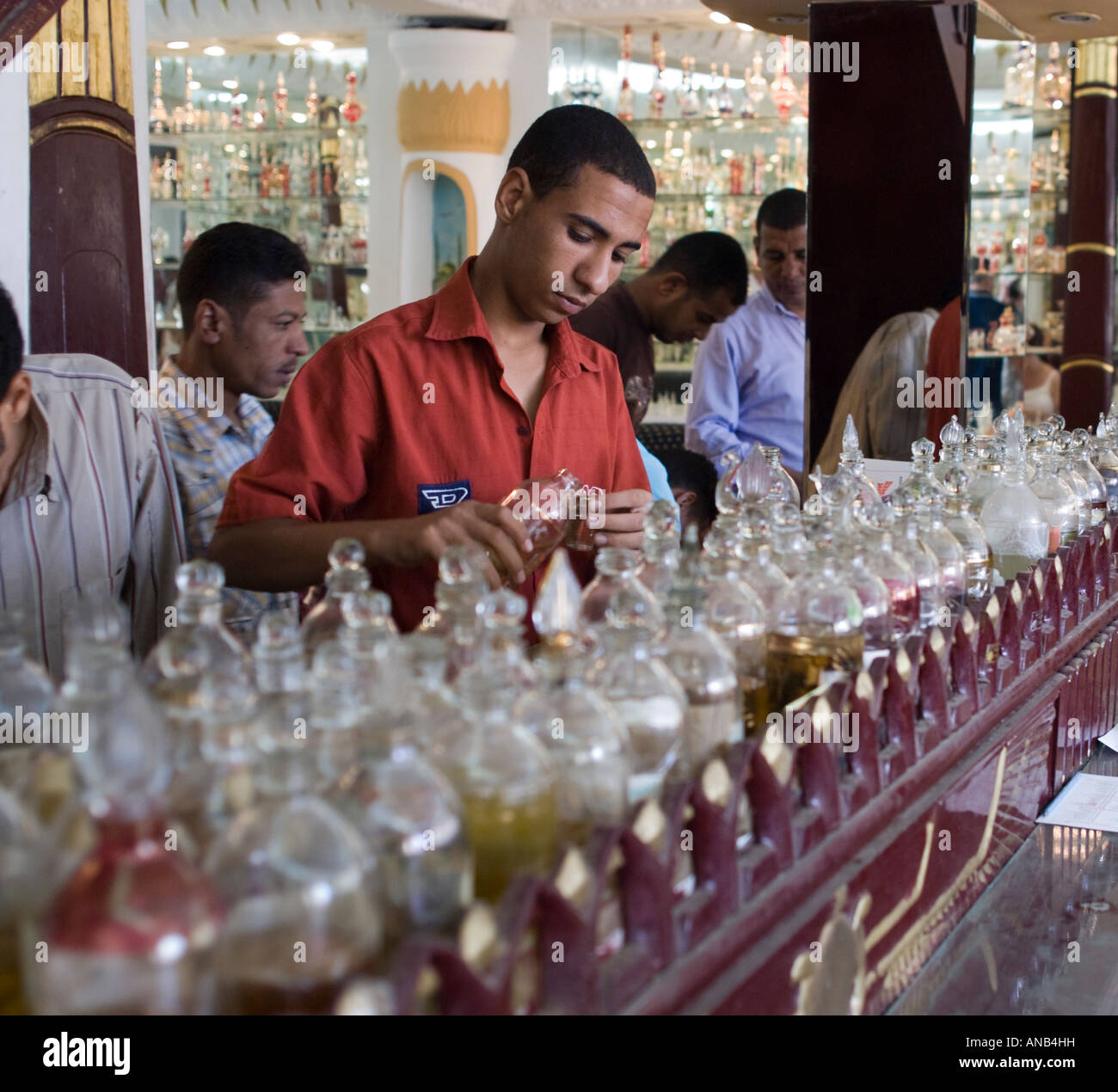 Egypt Luxor selecting essential perfume oils in a glass blowing