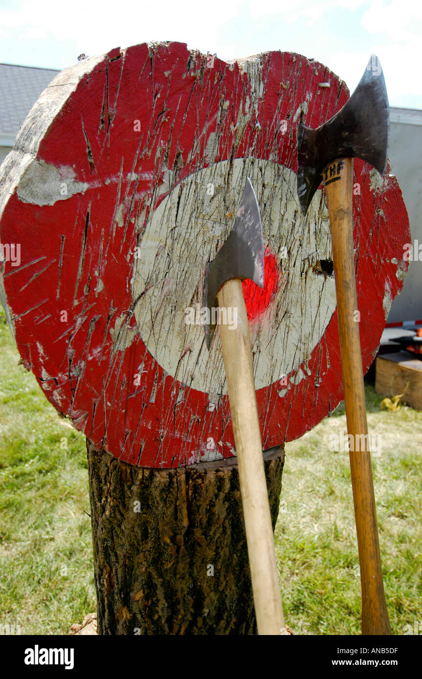 Bulls eye target aim goal objective aim axe throw toss hires stock