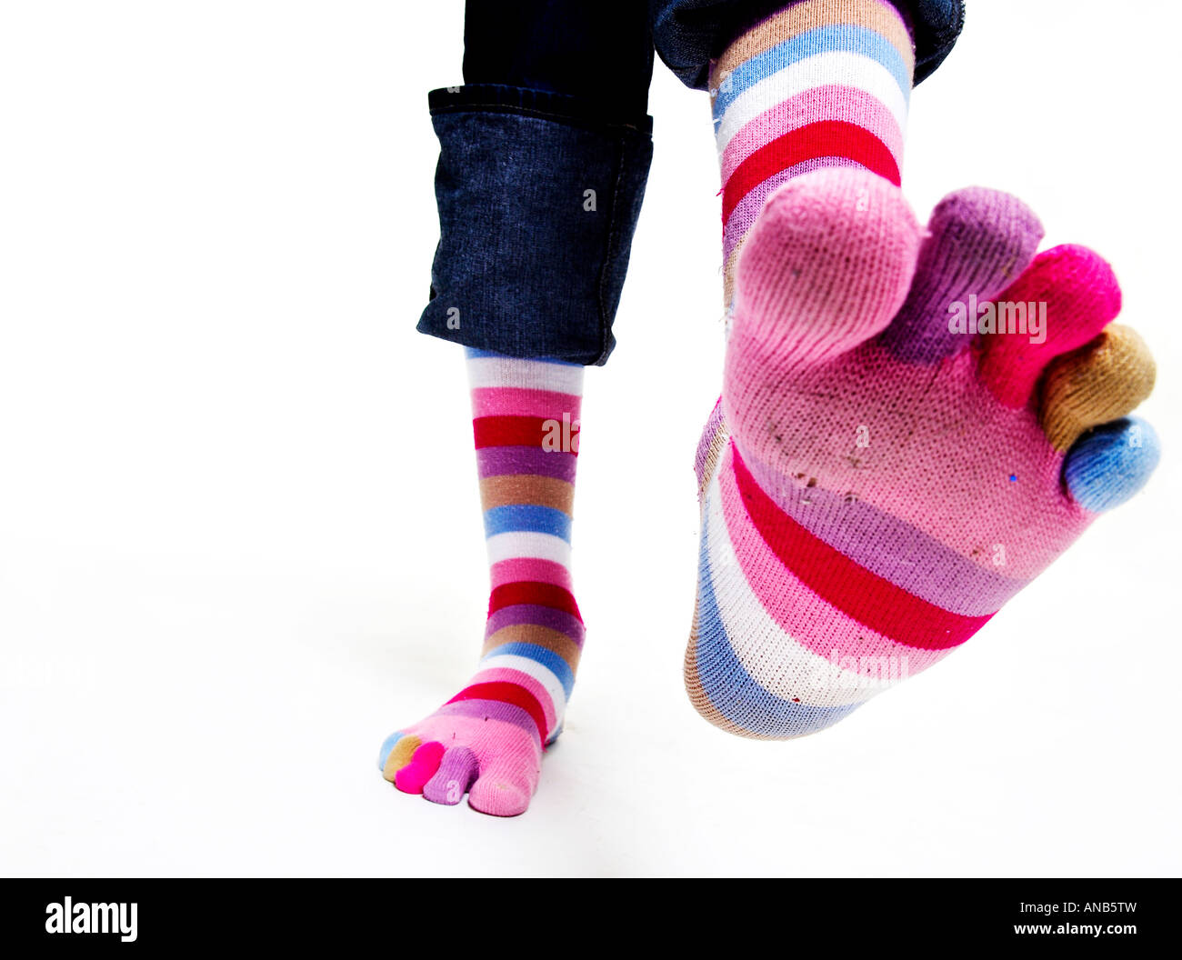 A very large foot wearing funny sock Stock Photo Alamy
