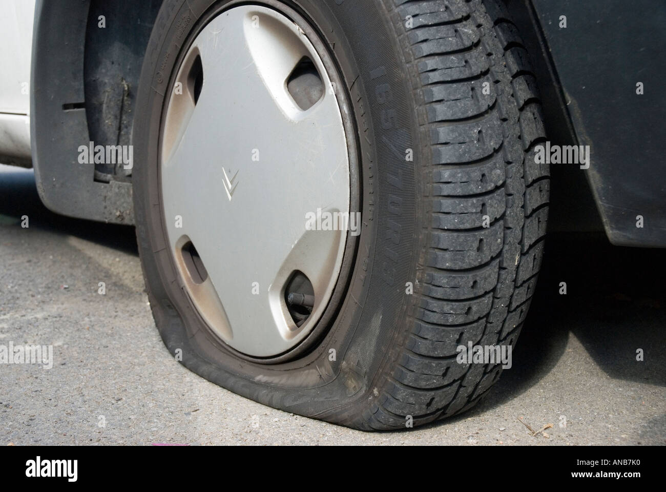 Close up of a flat car tyre Stock Photo